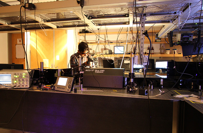 Ved Singh working in the Condon Ultrafast Laser Laboratory